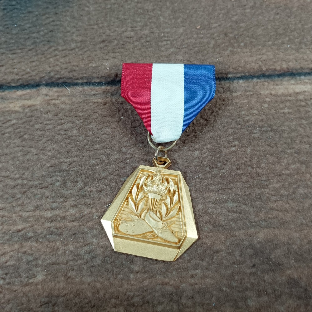 Vintage 1974 LM Relays Track Field Gold Tone Medal Red White Blue Ribbon Pin